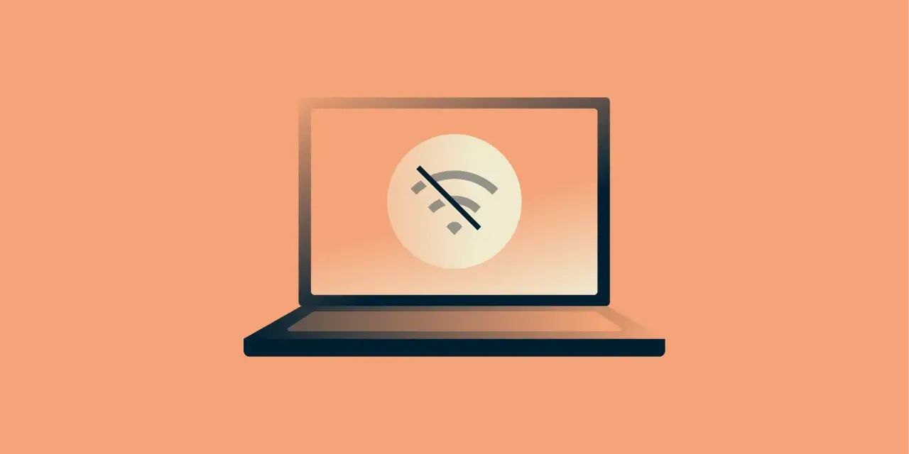 Laptop z symbolem przekreślonego Wi-Fi. Brak internetu uniemożliwia pracę.