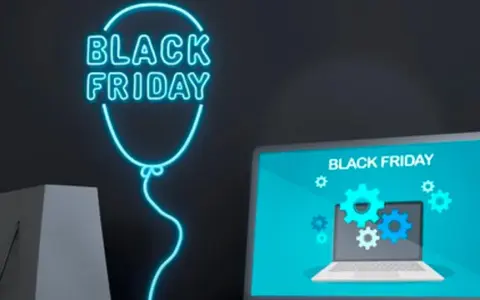 Neonowy balon z napisem "Black Friday" i laptopem. Dowiedz się, jak bezpiecznie kupować w internecie podczas wyprzedaży.