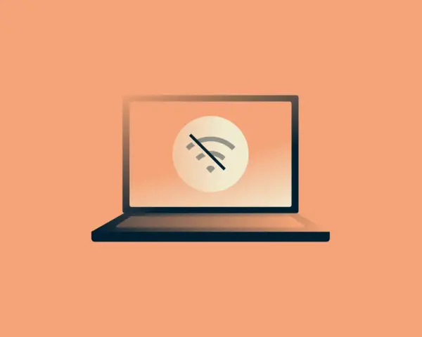Laptop z symbolem przekreślonego Wi-Fi. Brak internetu uniemożliwia pracę.
