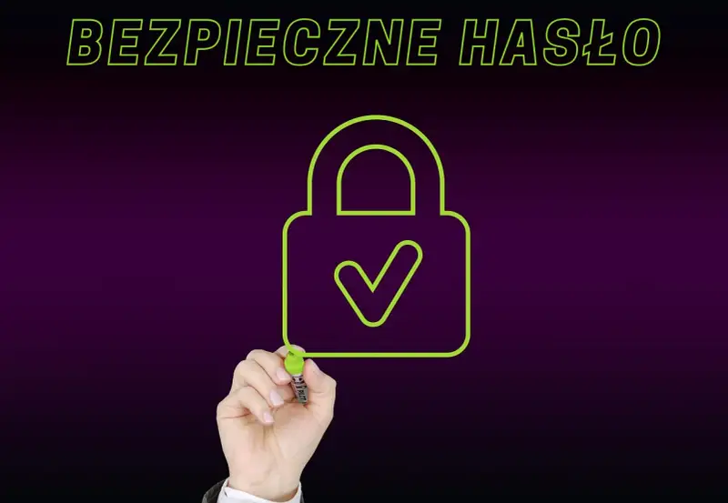 Ręka rysuje zieloną kłódkę z zaznaczeniem, symbolizującą silne hasło. Napis "BEZPIECZNE HASŁO" podkreśla znaczenie ochrony danych.